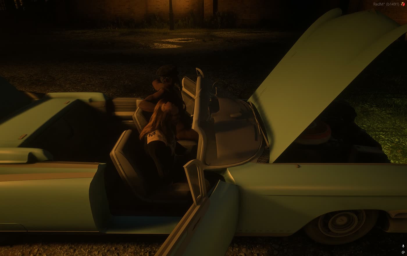 Doors and hood open on a parked car