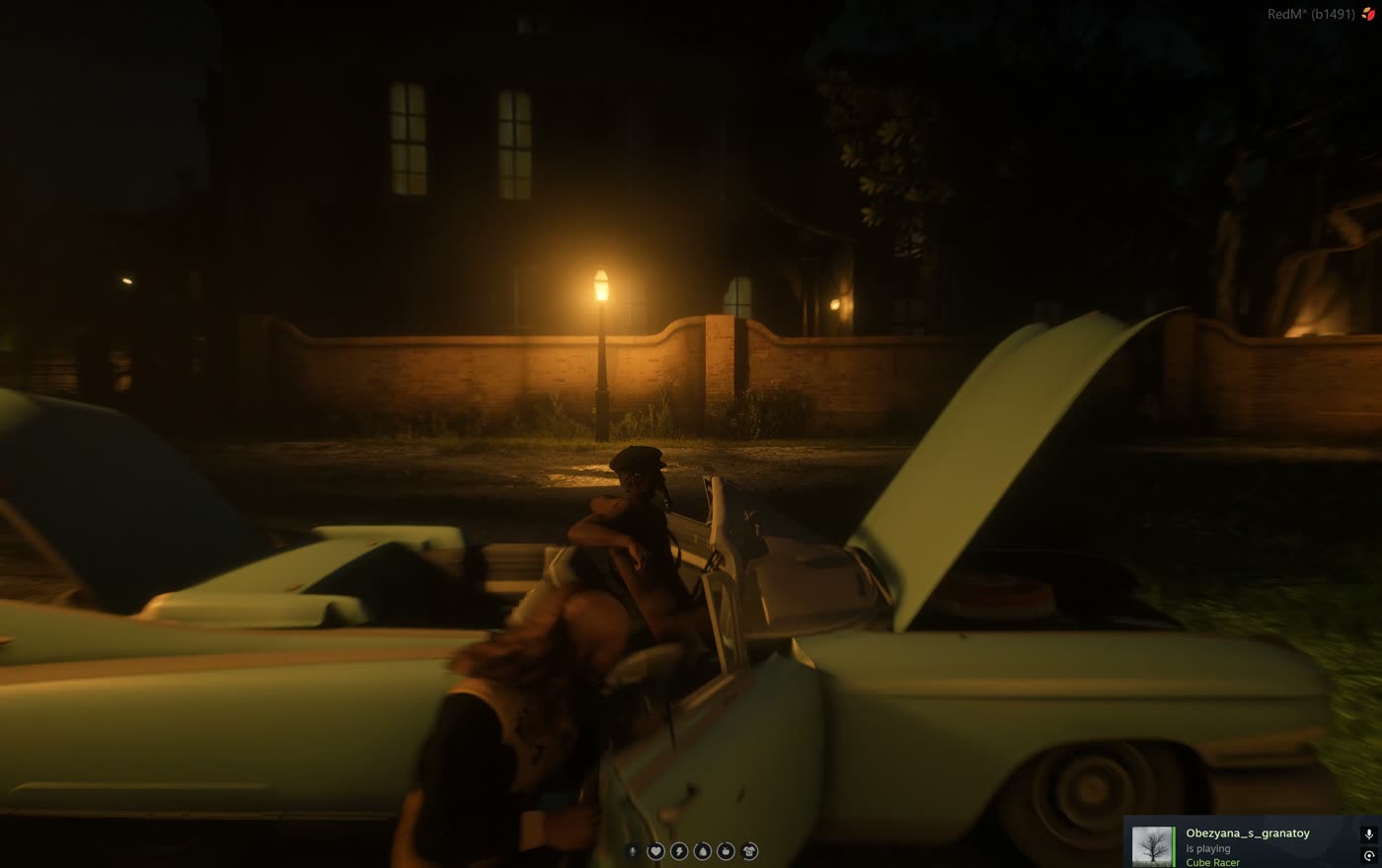 Two players around an open car