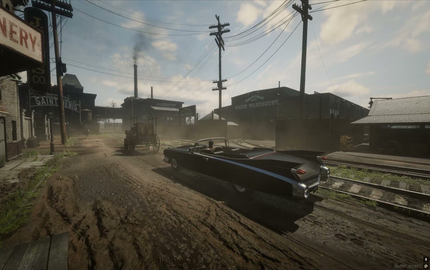 A car driving down a dusty industrial street