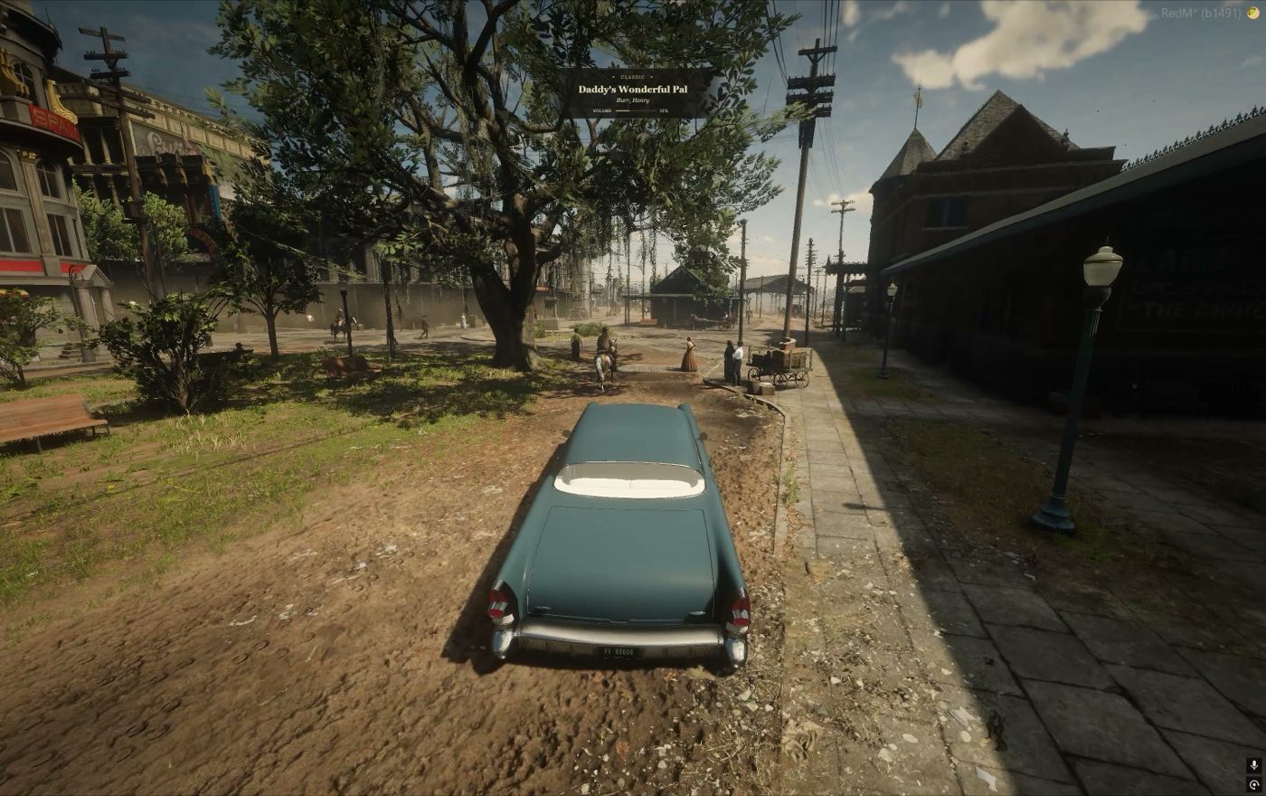 A car parked by the depot under a live oak