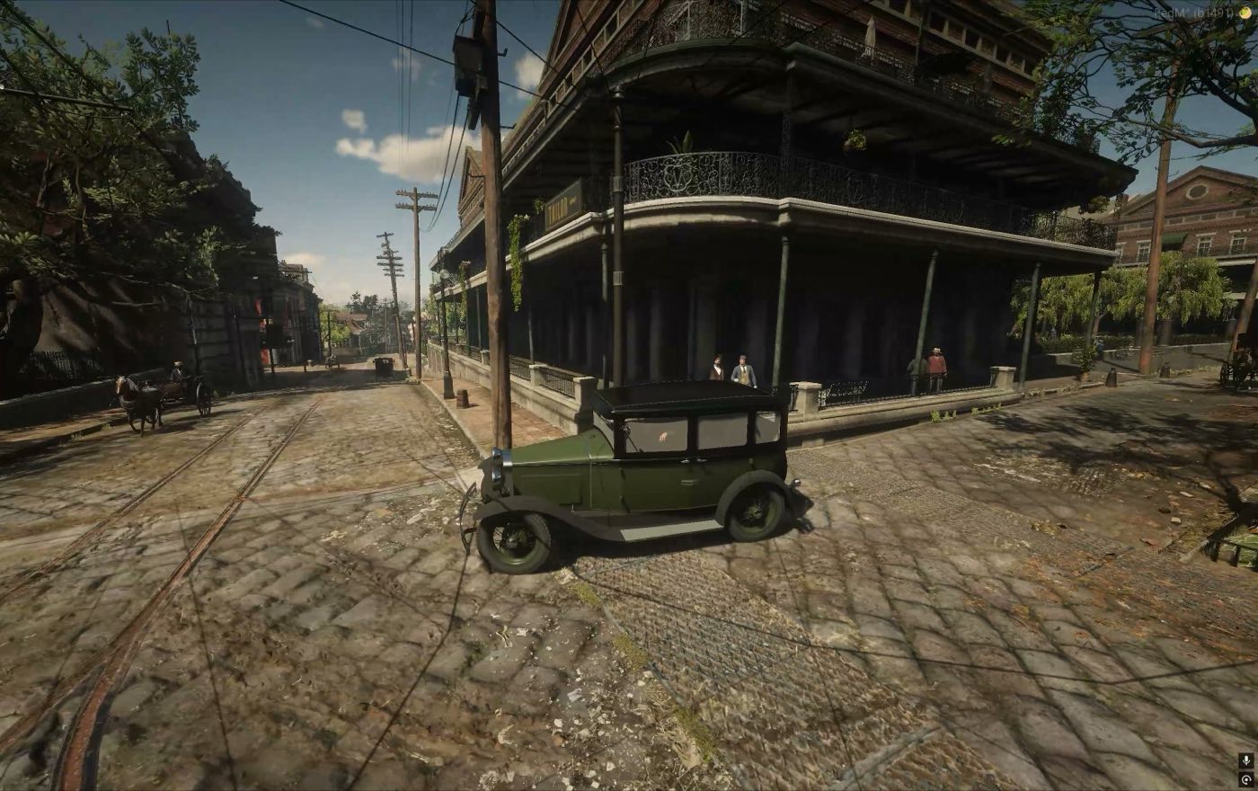 A delivery car standing at the corner of a town street