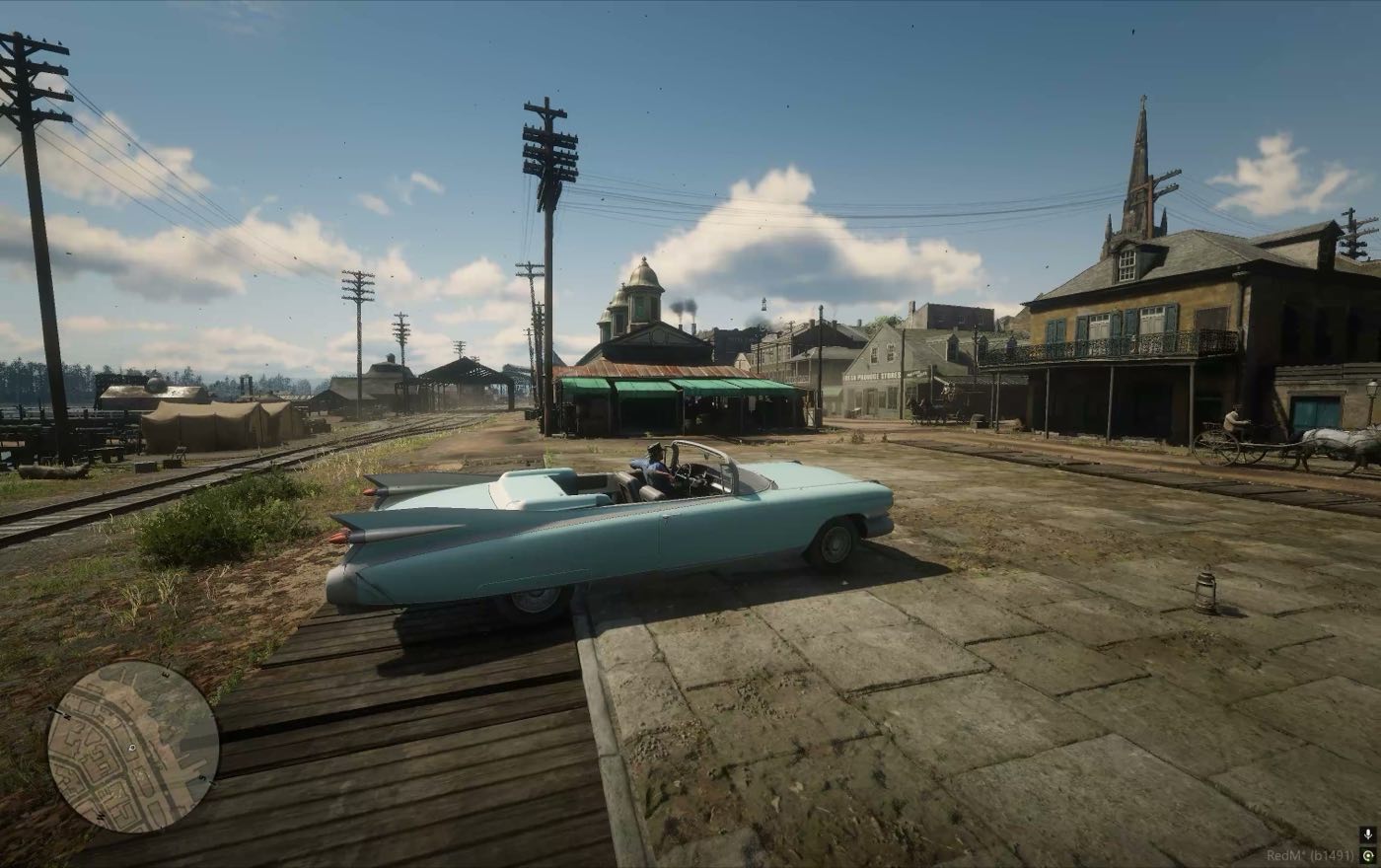 A car on the boardwalk at the edge of town