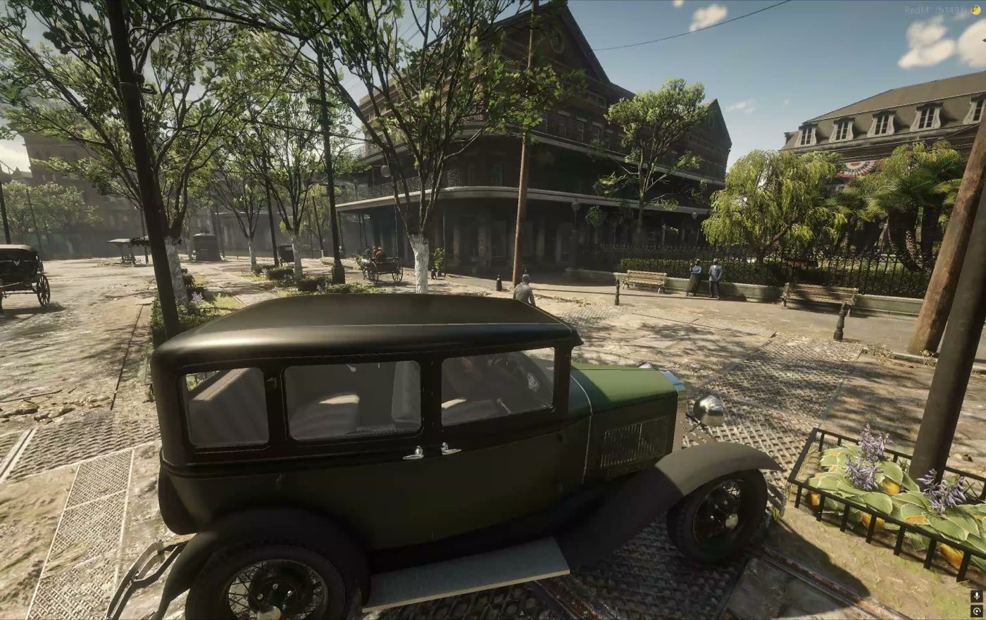 A closed body car standing in the town square